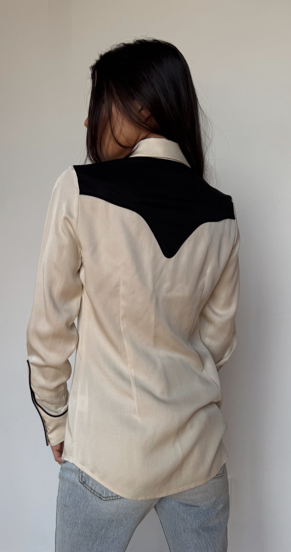 Back view of the H Bar C San Juan women's off white shirt with contrasting black back yoke.