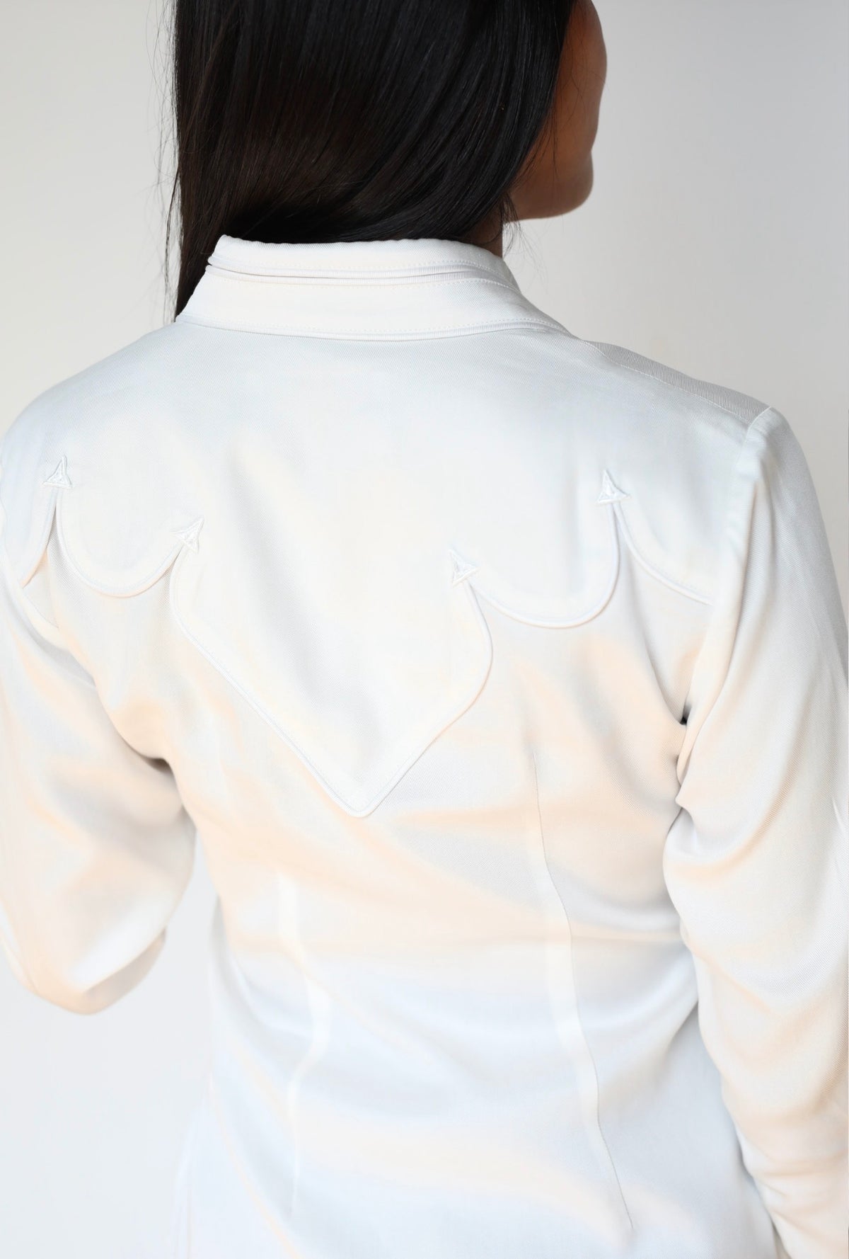 Back view of the H Bar C Lake Tahoe women's white shirt showing the piped western back yoke.