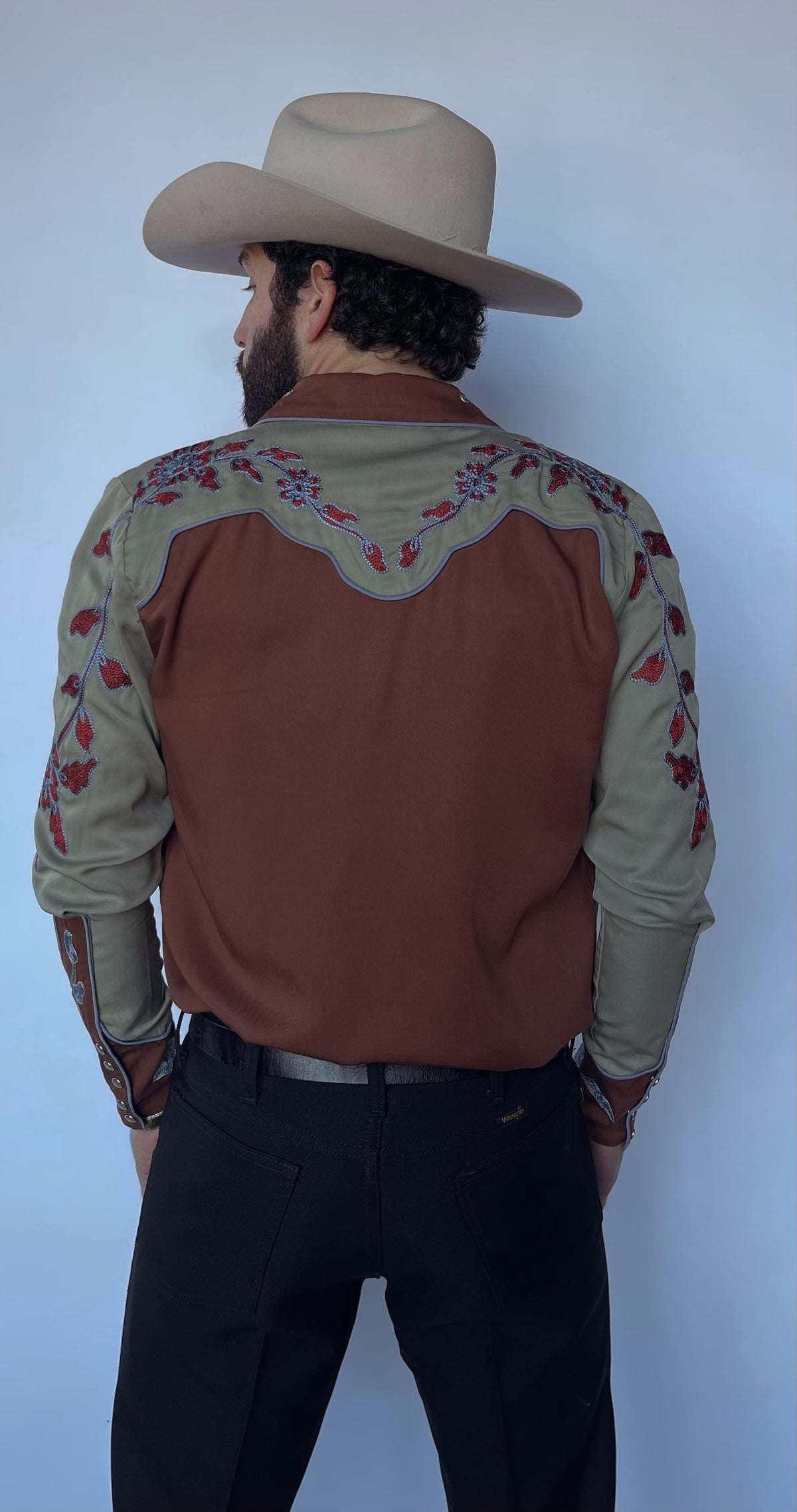 Back view of the H Bar C San Antonio brown shirt with embroidered sage green back yoke and sleeves.