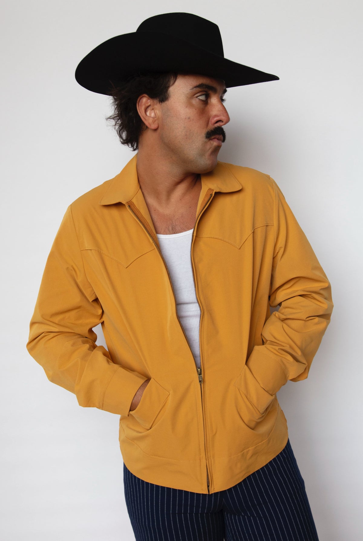 Three-quarter view of the H Bar C Mustang mustard yellow vintage-inspired jacket.