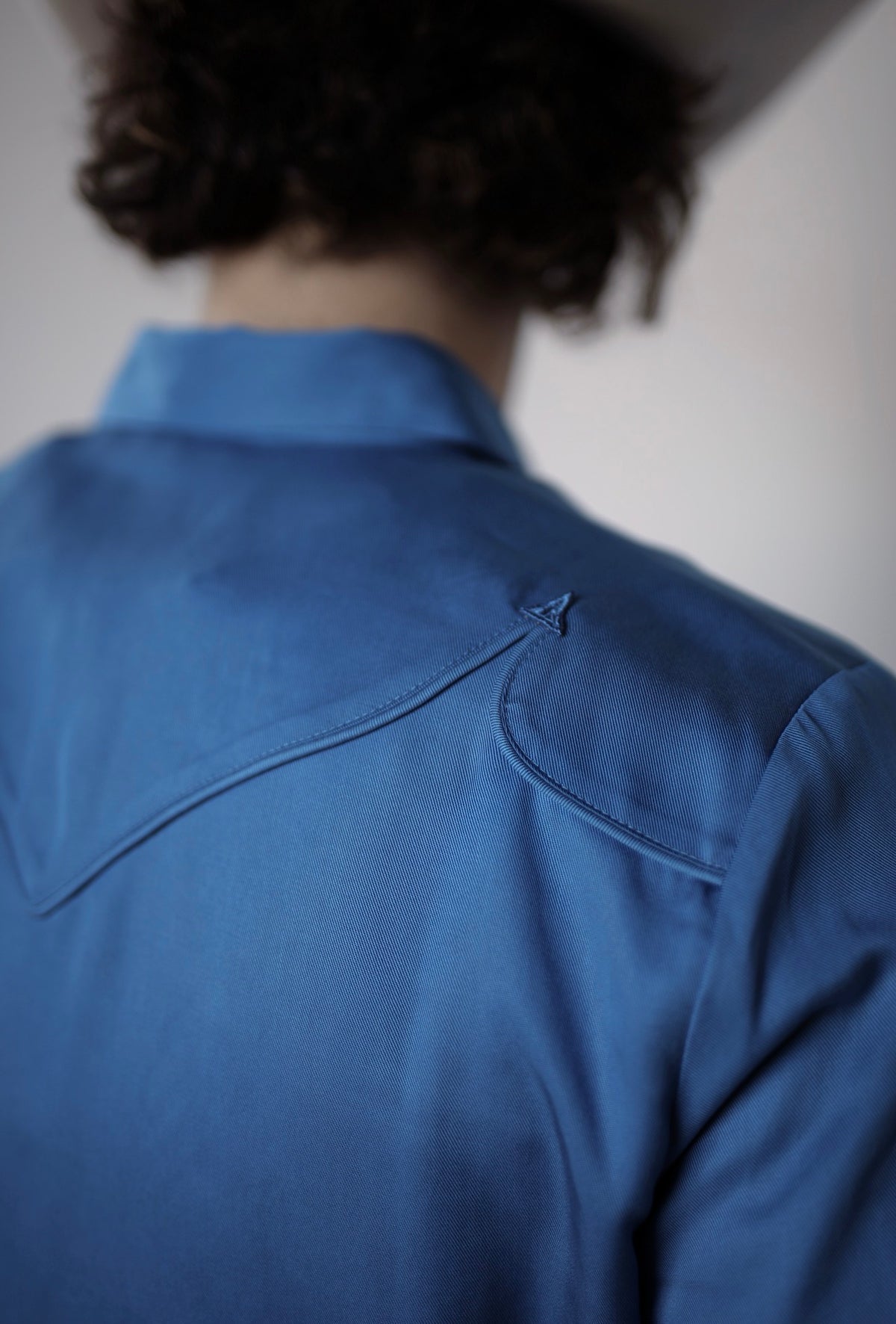Back yoke detail of the H Bar C Reno royal blue western shirt.