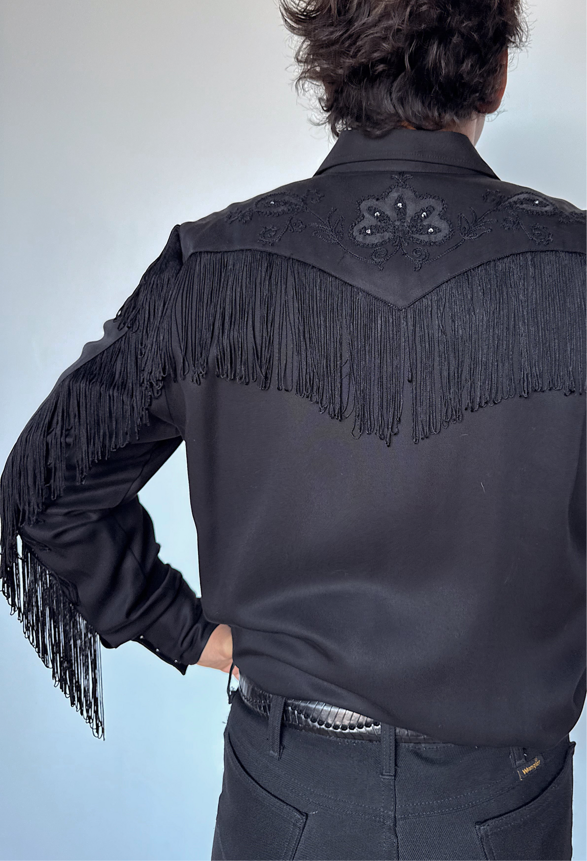 Back view of the H Bar C Taos men's all black fringe western shirt.