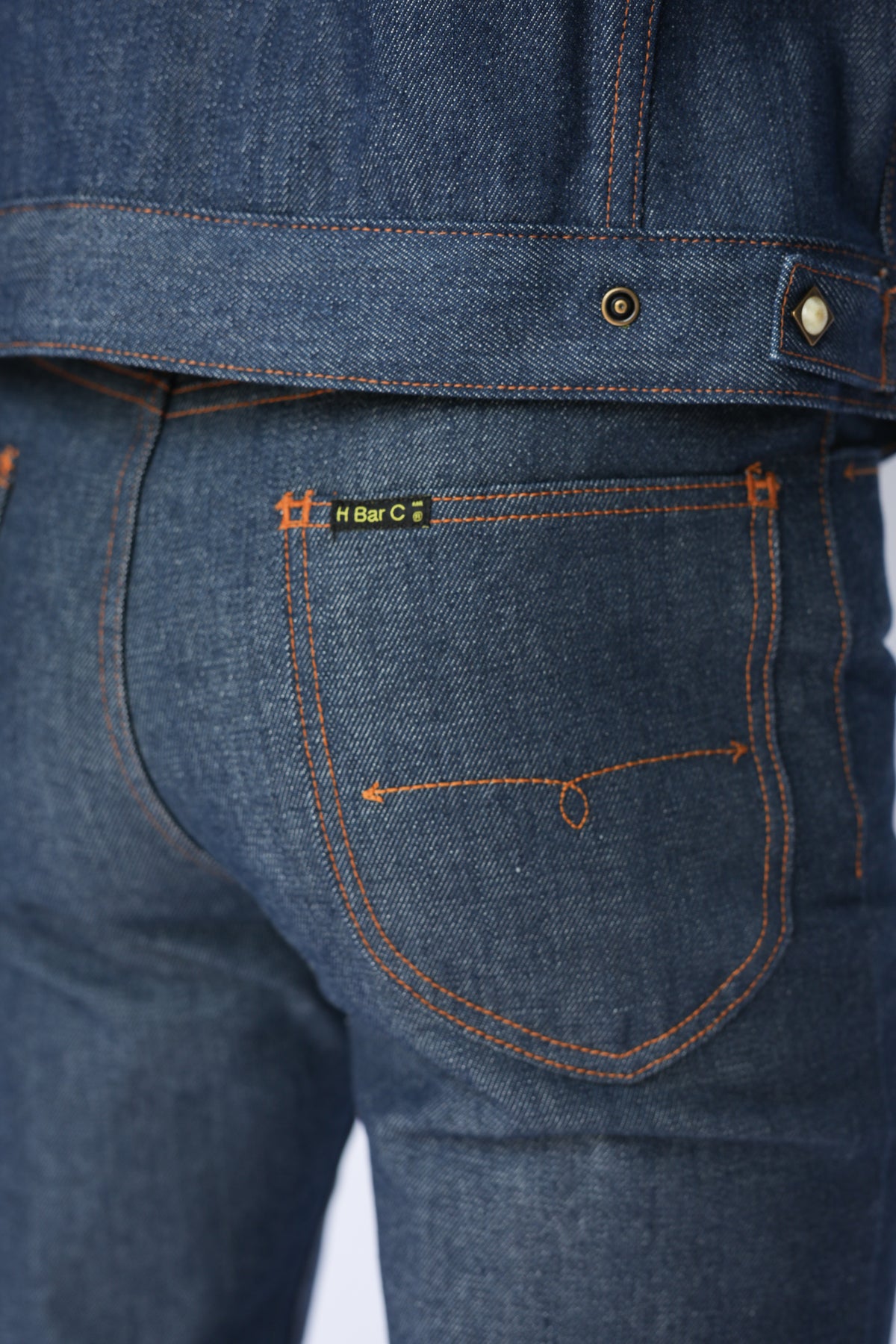 Back pocket close-up of the H Bar C Salina indigo jeans with contrast stitching.