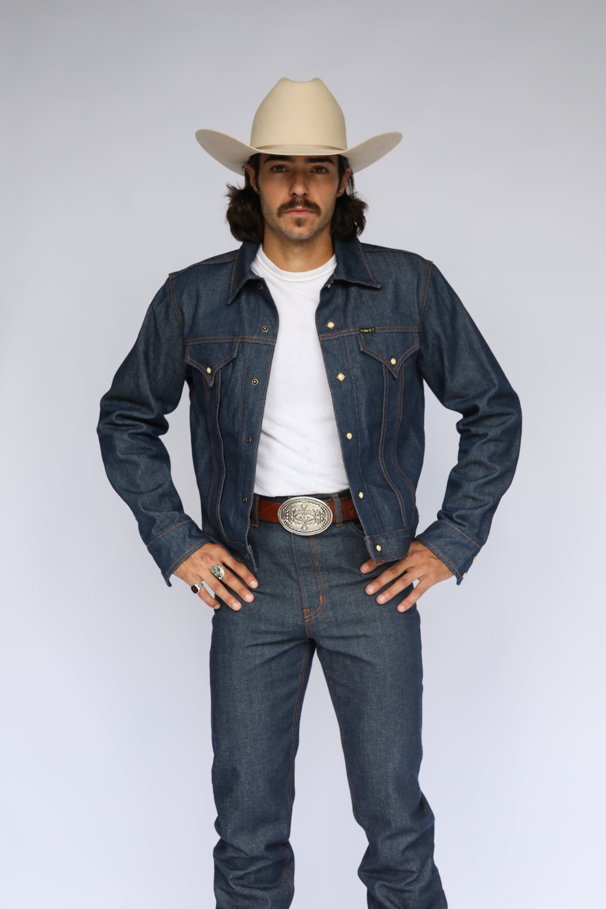 Front view of the H Bar C Salina trucker jacket in rigid indigo denim, patterned from vintage western originals.