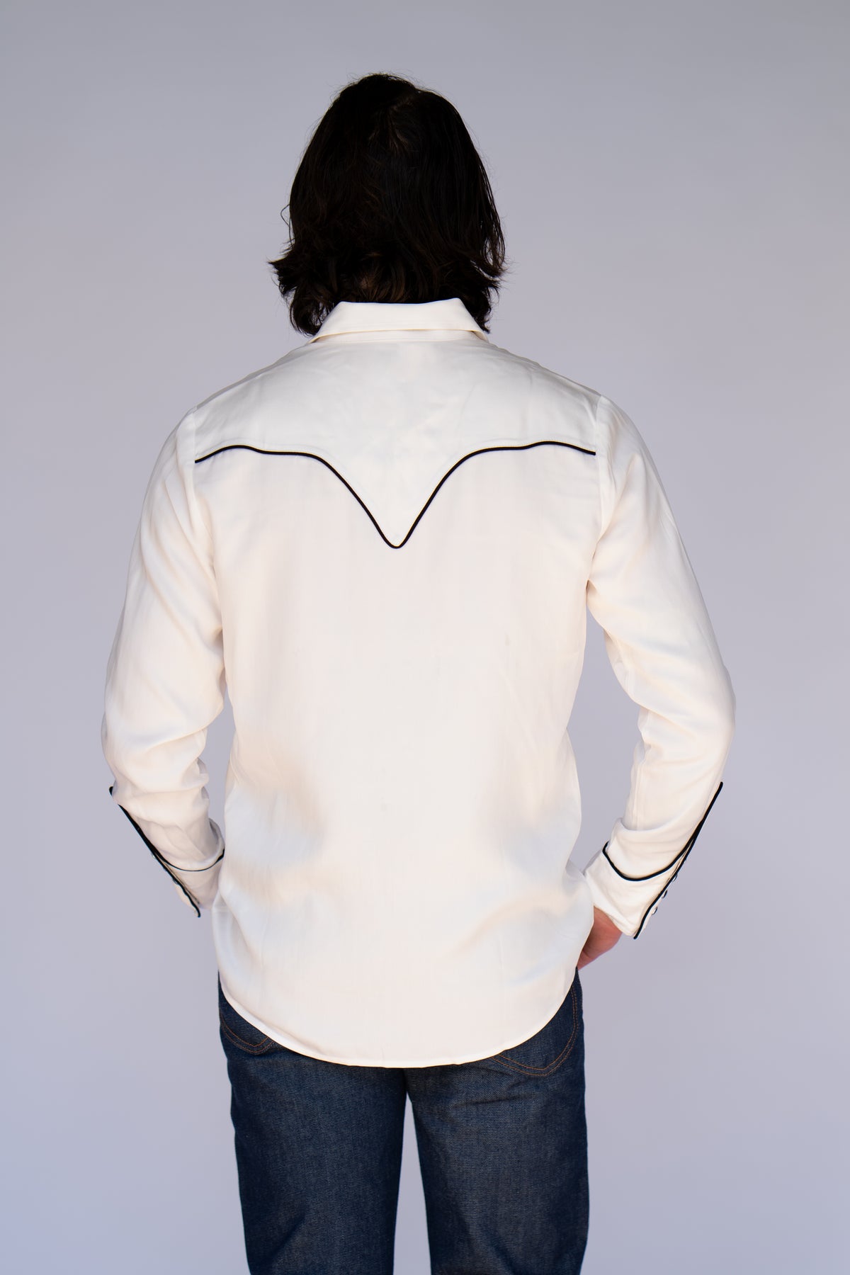 Back view of the H Bar C San Fernando white western shirt with black piped back yoke.