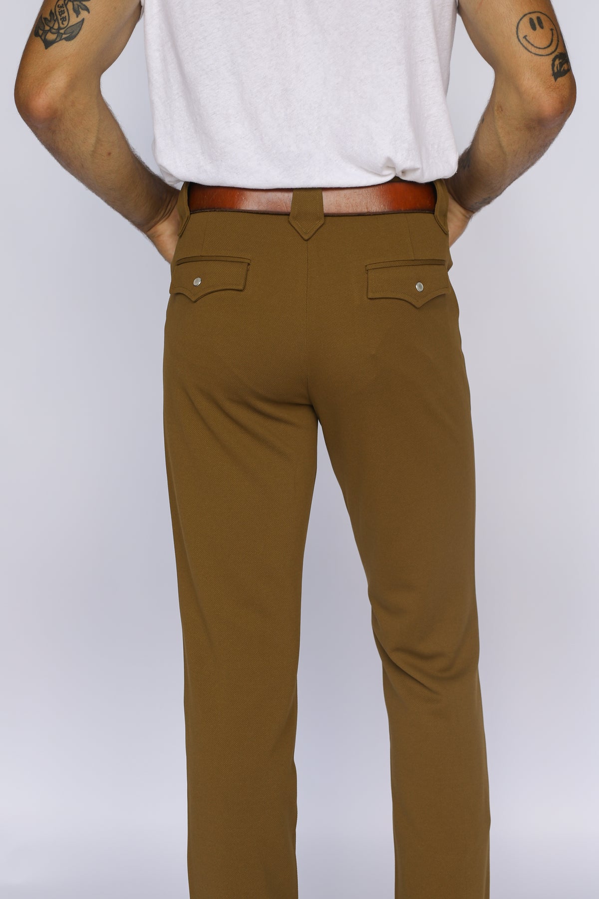 Back view of the H Bar C Franklin olive green western pants from the waist down.