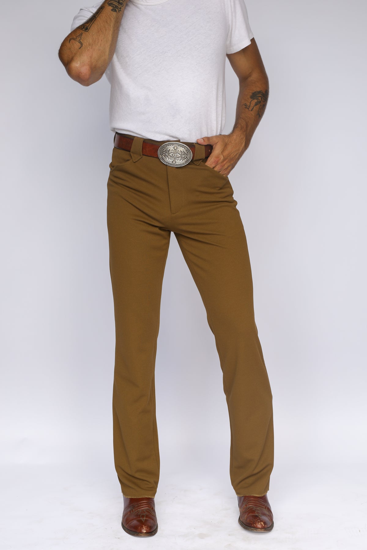 Front view from the waist down of the H Bar C Franklin olive green western pants with boots.