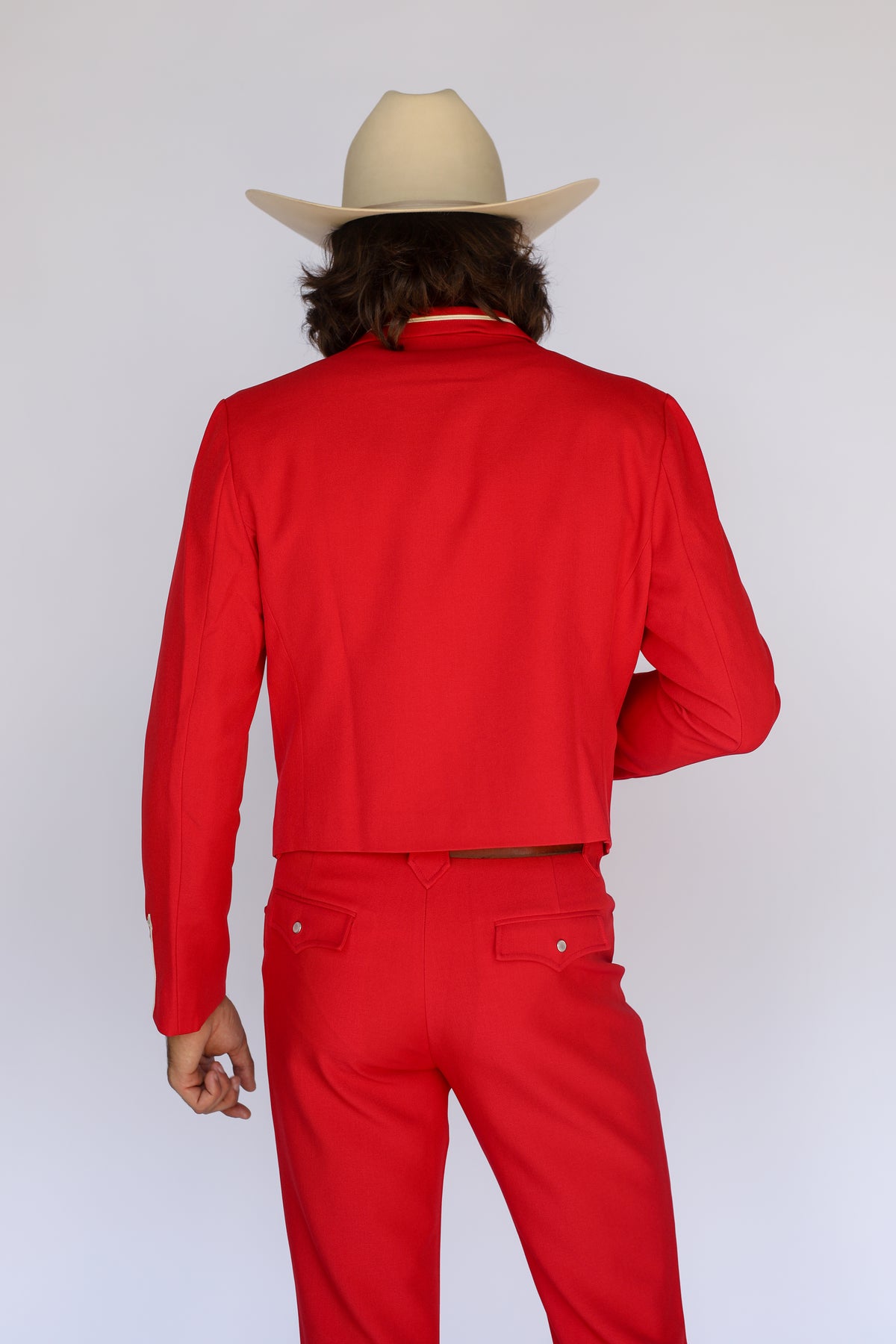 Back close-up of the H Bar C Calamity red western jacket and matching pants.
