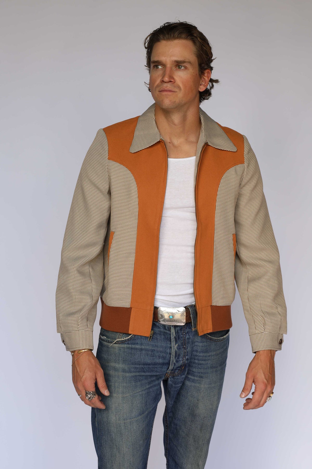 Front view of the H Bar C Kentucky unisex jacket in brown houndstooth with rust suede yoke, a 1950s H Bar C reproduction.