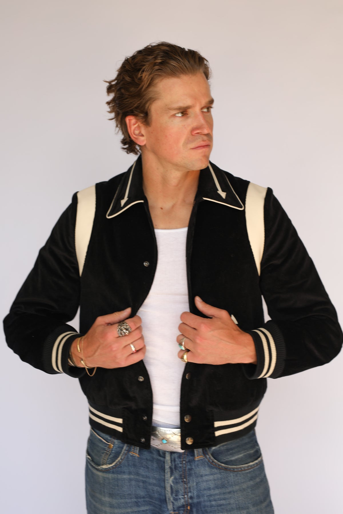 Front view of the H Bar C Silver Lake unisex jacket in black corduroy, vintage western wear with a piped collar, snap front, and striped ribbed trim.
