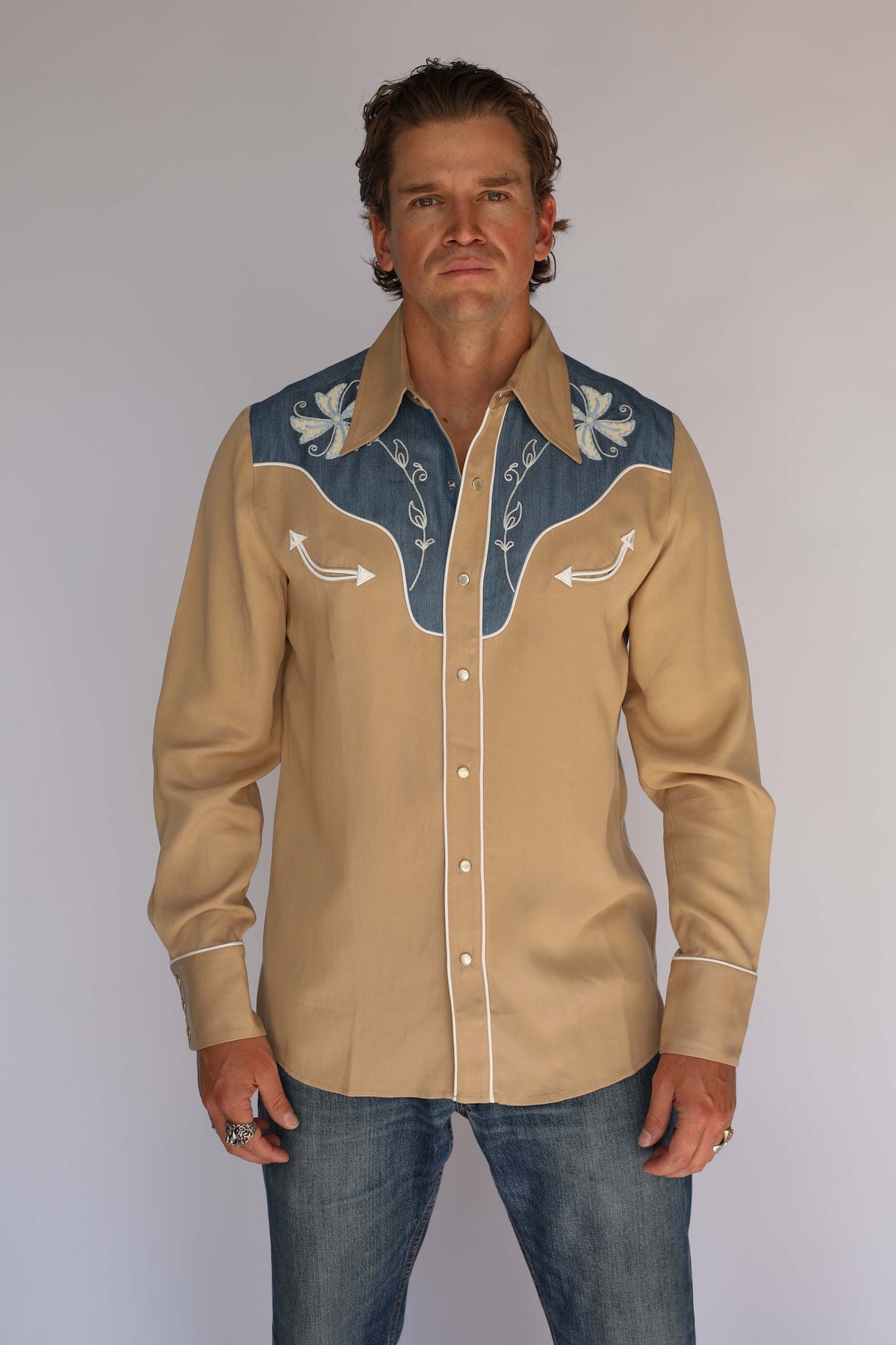 Full front view of the H Bar C Telluride tan Tencel shirt, vintage inspired western wear with white piped cuffs and denim yoke.