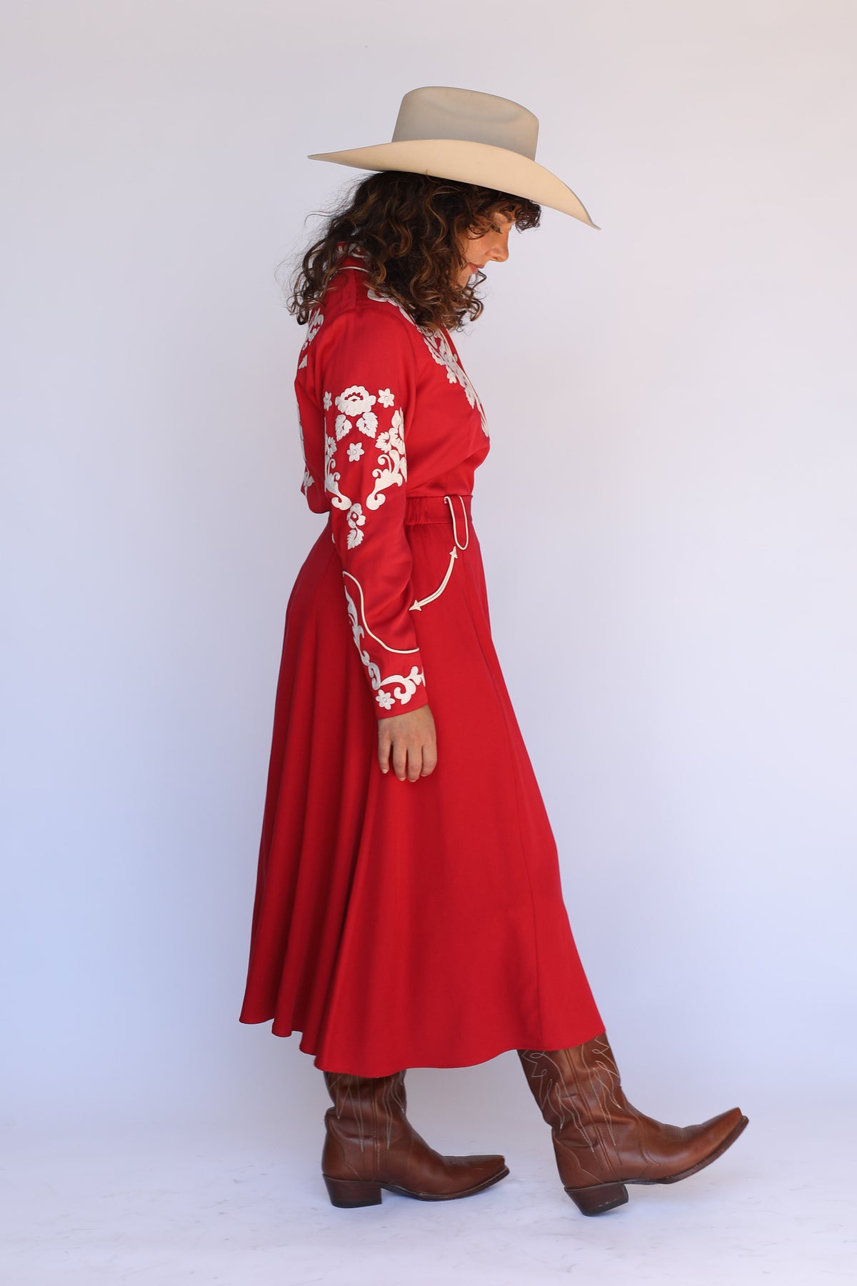 Side view of the H Bar C Fort Worth women's red embroidered western shirt, vintage western wear.