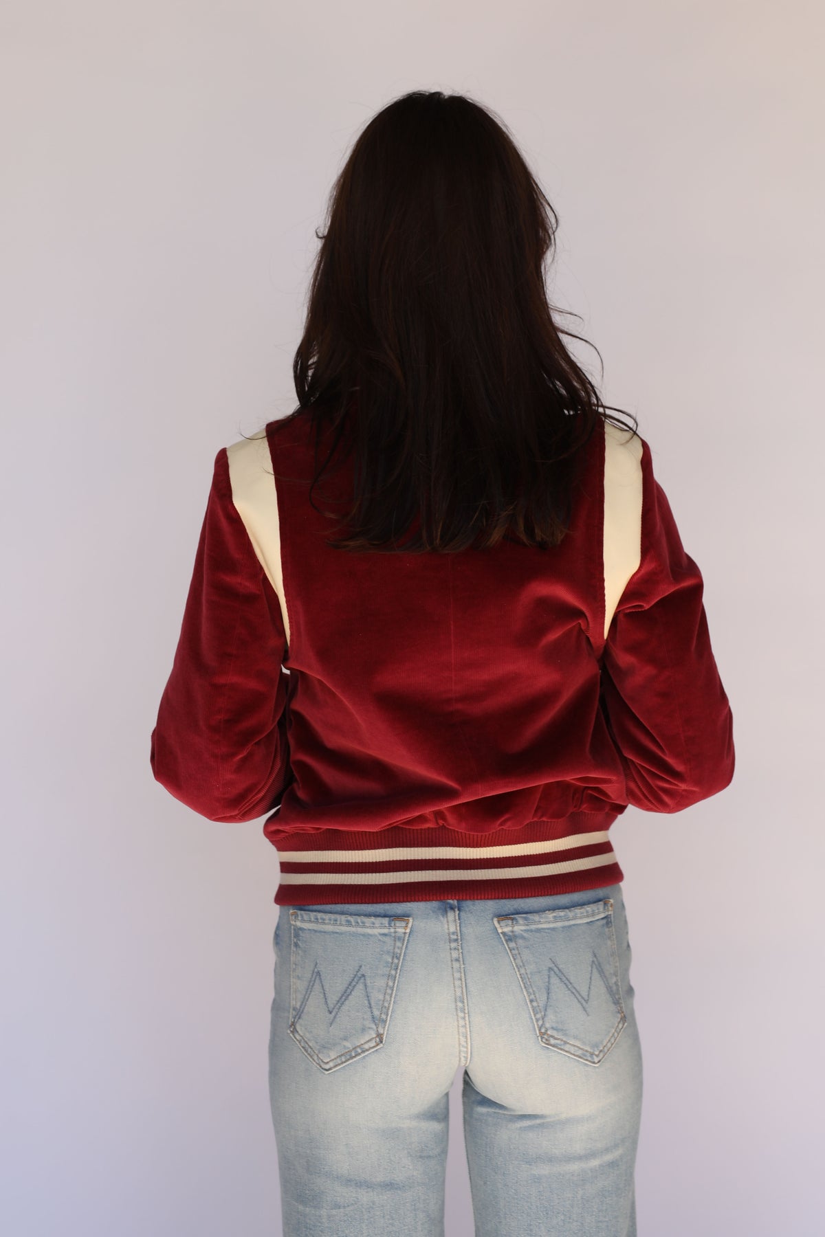 Back view of the H Bar C Silver Lake maroon corduroy jacket on a woman.