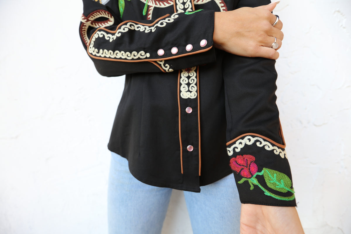 Sleeve detail of the multicolor chain stitch embroidery on the H Bar C Catalina women's black shirt.