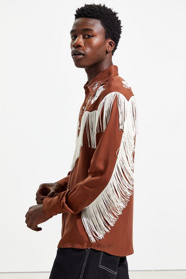 Side view of the H Bar C Taos brown western shirt showing white sleeve fringe.